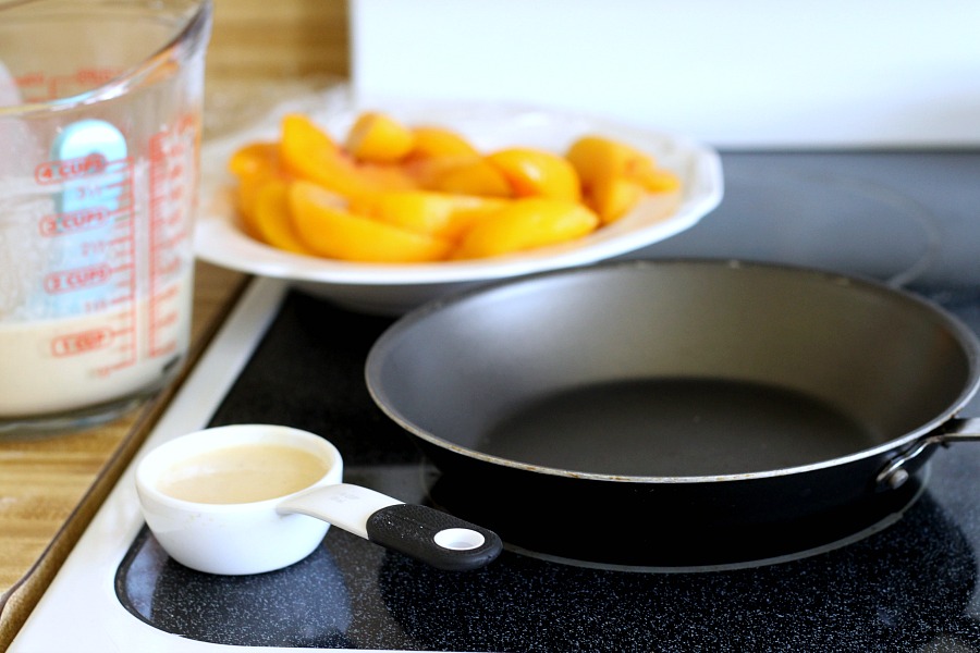 Peaches and Cream Cheese Crepes begins with a simple crepe, then filled with a sweetened cream cheese mixture, fresh sliced peaches, a sprinkling of brown sugar and a pat of butter that is then baked until warmed through. A dusting of confectioners' sugar and topped with whipped cream finishes this lovely dessert.