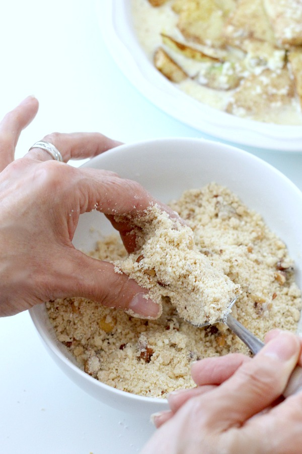 Lots of yummy apples fill this easy pie that makes its own crust. Topped with a sweet and crumbly streusel for a perfect dessert anytime.