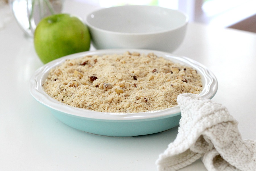 Lots of yummy apples fill this easy pie that makes its own crust. Topped with a sweet and crumbly streusel for a perfect dessert anytime.