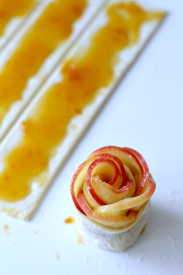 Rose Apple Pastries are pretty little bundles that taste like apple pie. Individual serving-size that look elegant and taste amazing but are an easy-to-make dessert using puff pastry sheets.