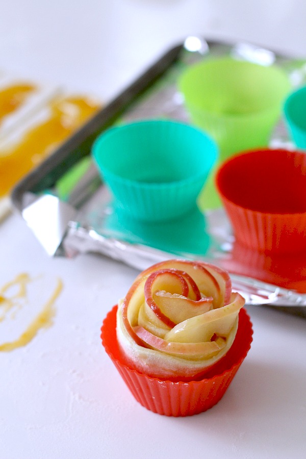 Rose Apple Pastries are pretty little bundles that taste like apple pie. Individual serving-size that look elegant and taste amazing but are an easy-to-make dessert using puff pastry sheets.