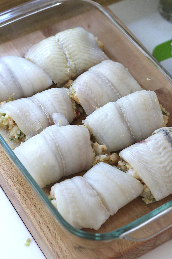 Delicious Shrimp Stuffed Flounder is easy and complany-special. Filled with sauteed veggies and seasonings, it is a favorite fish dinner entree.