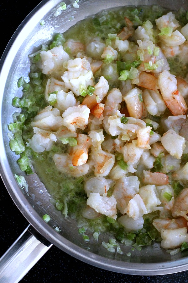 Delicious Shrimp Stuffed Flounder is easy and complany-special. Filled with sauteed veggies and seasonings, it is a favorite fish dinner entree.