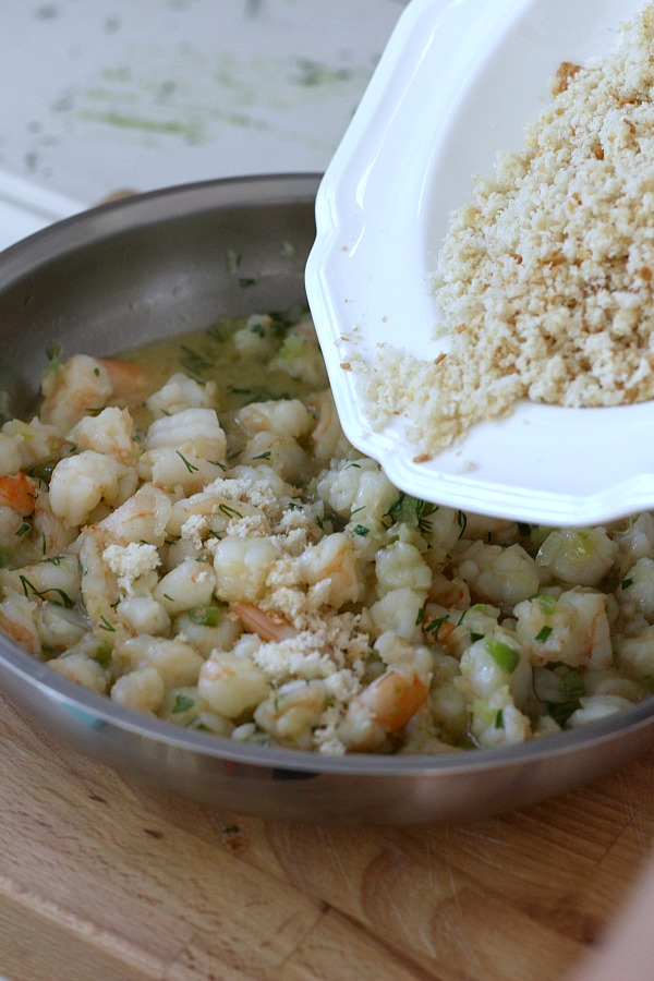 Delicious Shrimp Stuffed Flounder is easy and complany-special. Filled with sauteed veggies and seasonings, it is a favorite fish dinner entree.