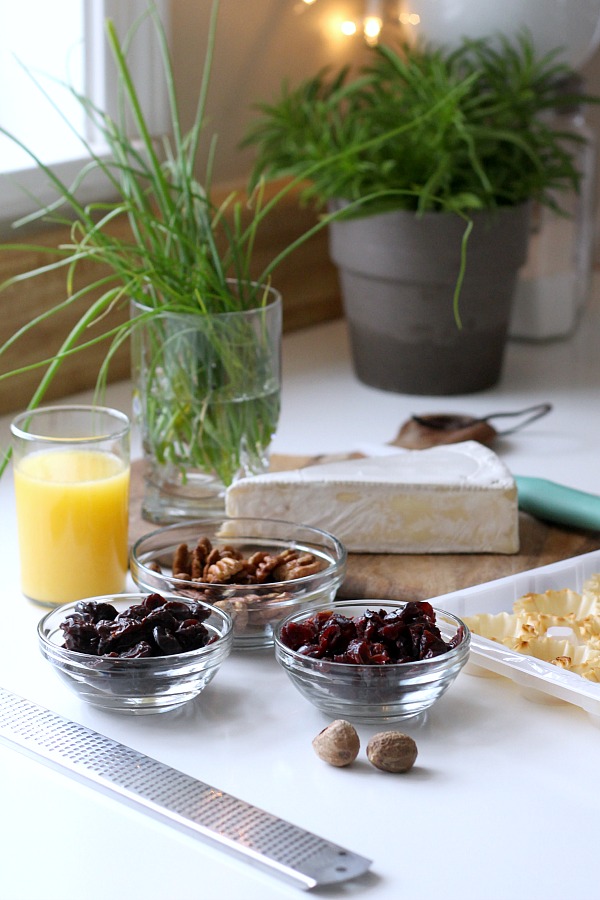 The holidays are a special time of entertaining and parties. Even a small get together with just a few friends is reason enough to set out some tasty tidbits. Brie tartlets with cranberries and cherries is a tasty appetizer that easy, quick and yummy!