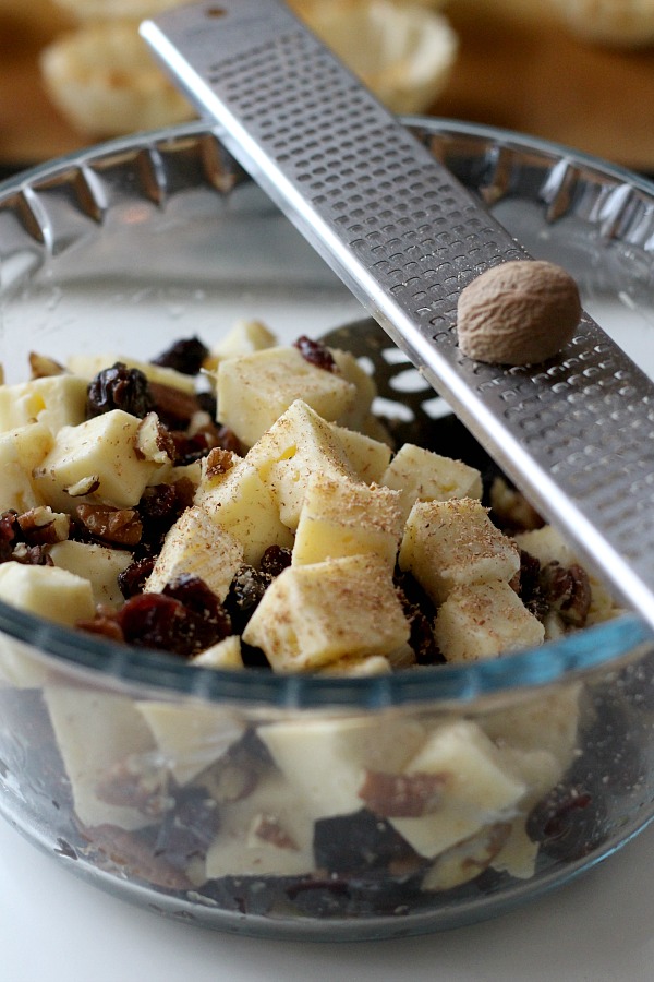 The holidays are a special time of entertaining and parties. Even a small get together with just a few friends is reason enough to set out some tasty tidbits. Brie tartlets with cranberries and cherries is a tasty appetizer that easy, quick and yummy!