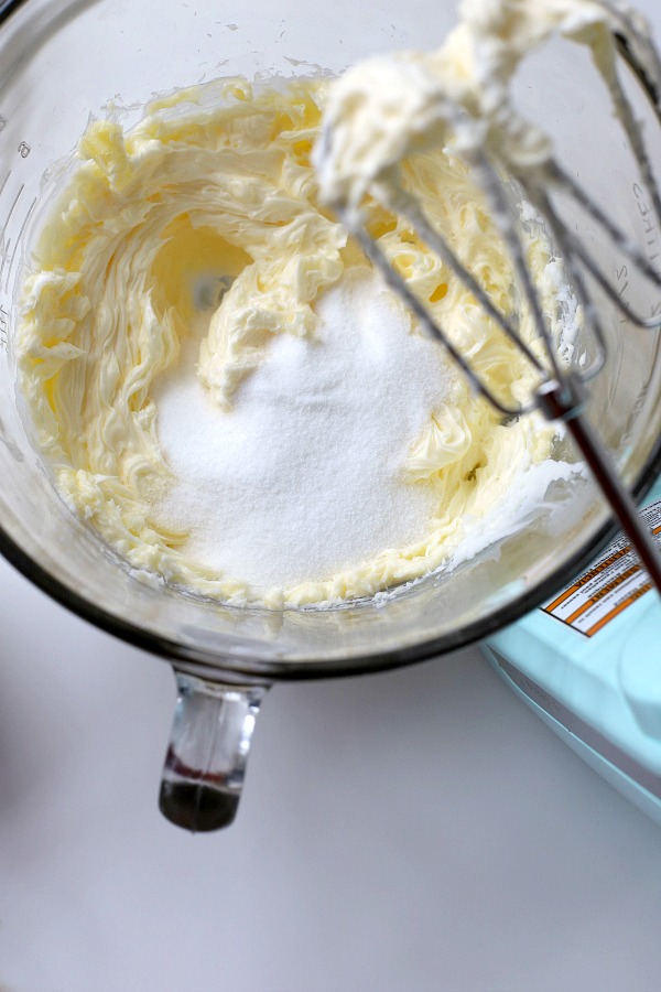 From scratch recipe for a moist red velvet marbled cake made in a Bundt pan has a lovely icing just right for Valentine's Day or celebrating a birthday.