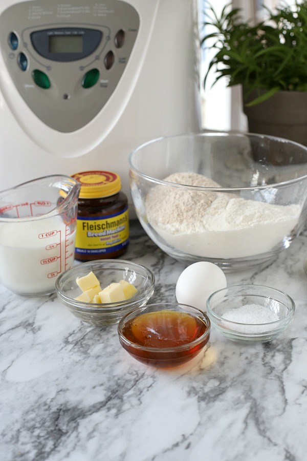 Easy recipe for delicious homemade honey whole wheat bread uses a bread machine to make the dough. Shape into loaves and bake. Perfect for slicing too.