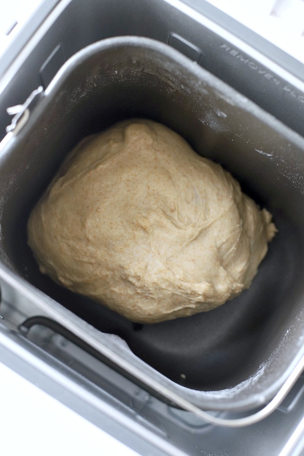 Easy recipe for delicious homemade honey whole wheat bread uses a bread machine to make the dough. Shape into loaves and bake. Perfect for slicing too.