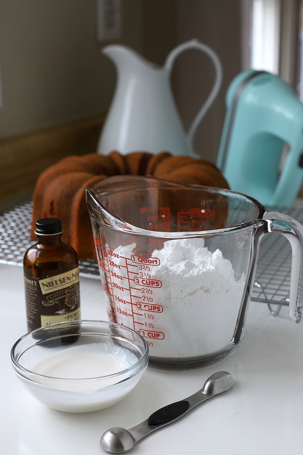 From scratch recipe for a moist red velvet marbled cake made in a Bundt pan has a lovely icing just right for Valentine's Day or celebrating a birthday.