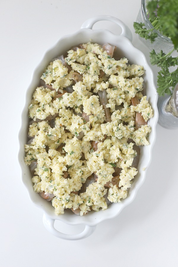 It couldn’t get any easier to make delicious baked shrimp scampi. Arranged in a baking dish, the shrimp are topped with a buttery herb mixture and popped into the oven until hot and bubbly.