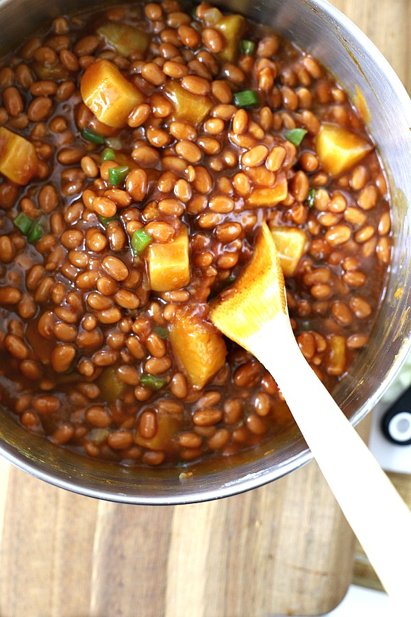 Everyone's favorite cookout side, Hawaiian Baked Beans with pineapple, molasses and brown sugar is quick and easy. Make this recipe on the stove top or bake in the oven. A perfect side for burgers and hotdogs.