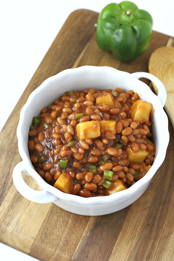 Everyone's favorite cookout side, Hawaiian Baked Beans with pineapple, molasses and brown sugar is quick and easy. Make this recipe on the stove top or bake in the oven. A perfect side for burgers and hotdogs.