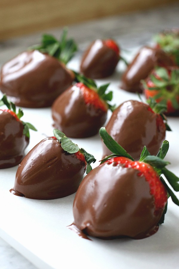 Chocolate covered strawberries are the perfect dessert for 4th of July or patriotic celebrations. Easy no-bake recipe for melting chocolate and decorating.