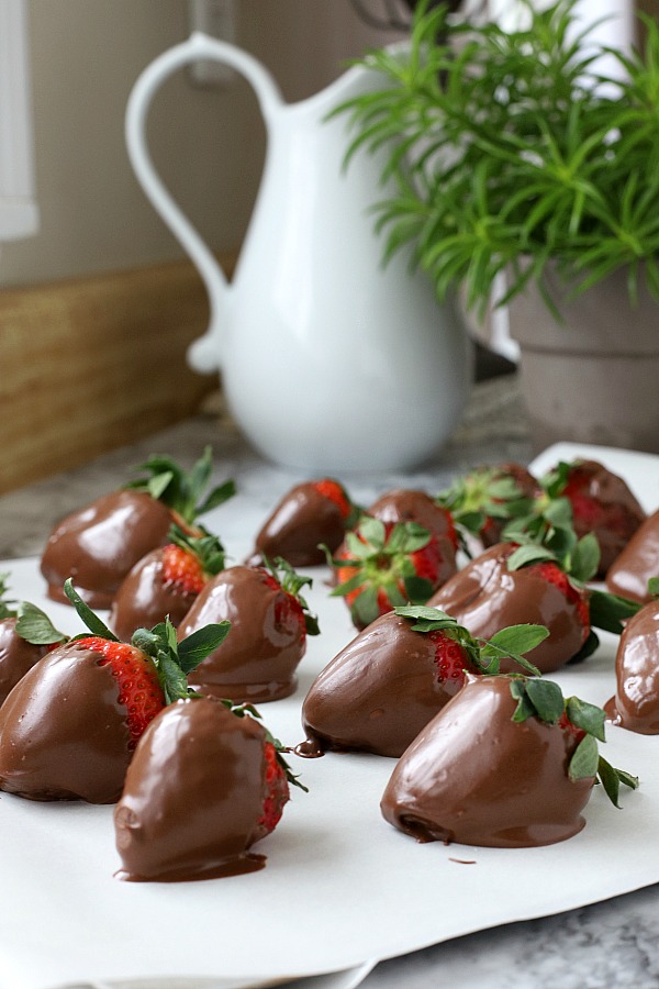 Chocolate covered strawberries are the perfect dessert for 4th of July or patriotic celebrations. Easy no-bake recipe for melting chocolate and decorating.