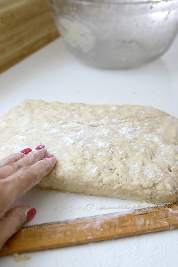 A hint of lavender gives sweet lavender scones a unique and lovely flavor using lavender buds from the herb garden. A light glaze makes them perfect.