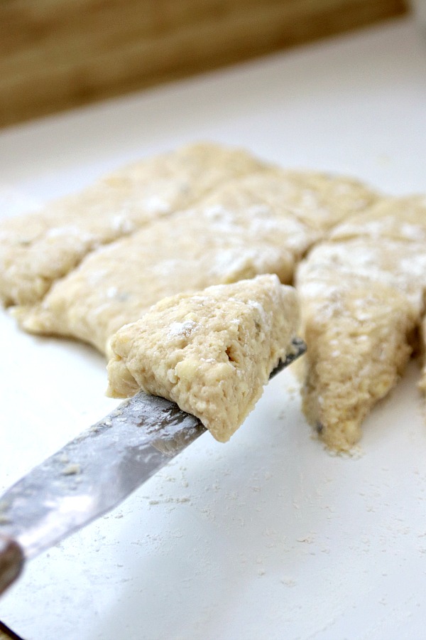 A hint of lavender gives sweet lavender scones a unique and lovely flavor using lavender buds from the herb garden. A light glaze makes them perfect.