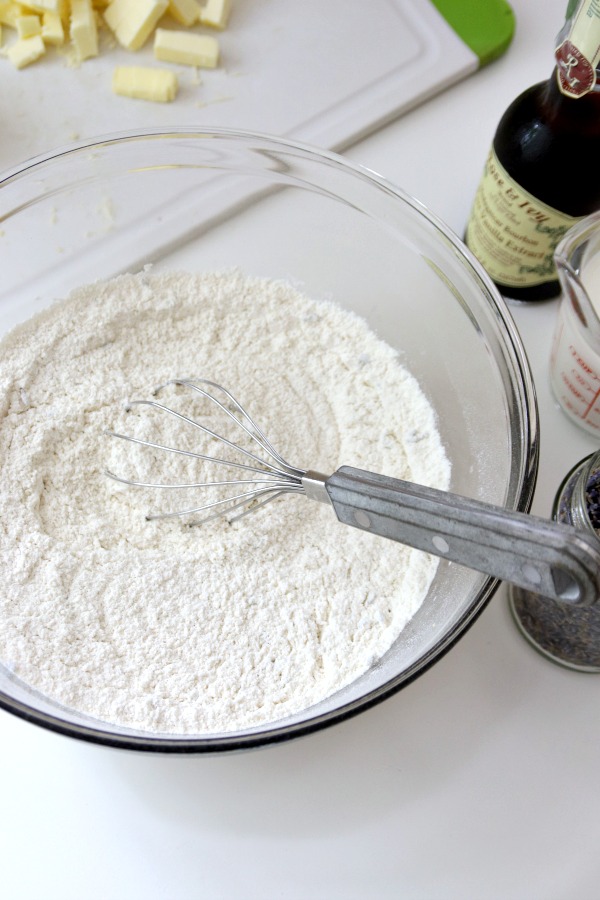 A hint of lavender gives sweet lavender scones a unique and lovely flavor using lavender buds from the herb garden. A light glaze makes them perfect.