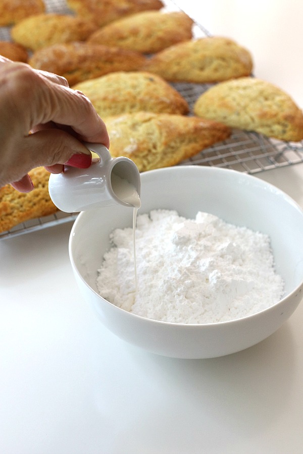 A hint of lavender gives sweet lavender scones a unique and lovely flavor using lavender buds from the herb garden. A light glaze makes them perfect.