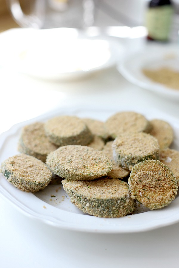 A summertime favorite, breaded fried zucchini is a great side or appetizer. Easy recipe using just a few ingredients and cooked in a skillet until golden brown and crispy.