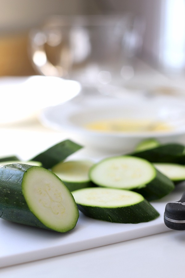 A summertime favorite, breaded fried zucchini is a great side or appetizer. Easy recipe using just a few ingredients and cooked in a skillet until golden brown and crispy.