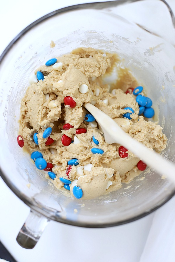 Celebrate the 4th of July with a giant patriotic peanut butter cookie pizza. Easy recipe the whole family will love.