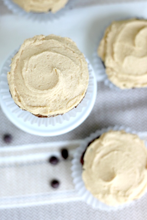 Dark and decadent chocolate zucchini cupcakes are moist and delicious. Add the amazing peanut butter frosting for a perfect dessert with a healthy quantity of zucchini that no one will notice.