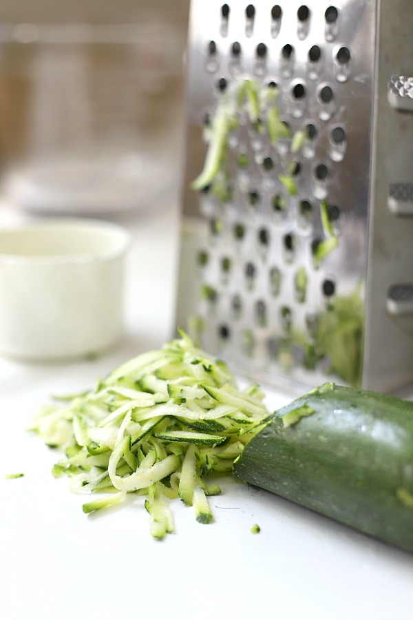 Zucchini bars with spice frosting are moist, delicious pack a lot of flavor in each piece. The frosting has a hint of cloves that perfectly complements and makes them irresistible.