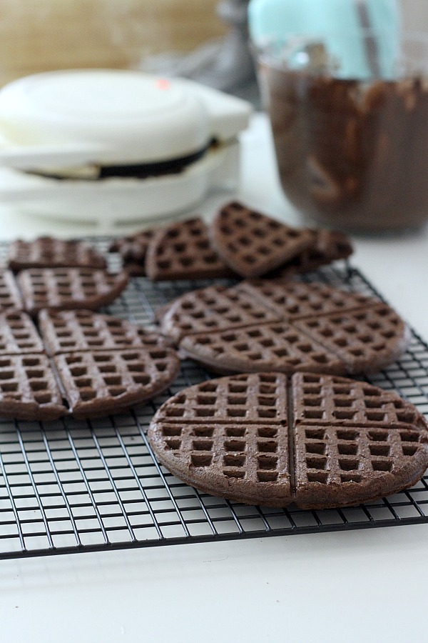 Cake Mix Chocolate Waffles filled with ice cream and dipped in sprinkles are an easy to make dessert and a fun change from birthday cupcakes.