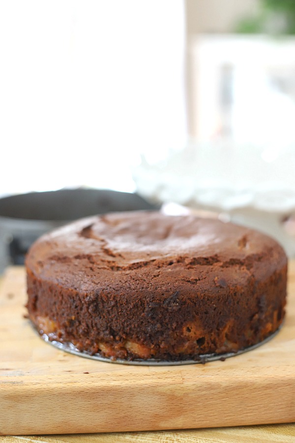 Easy step-by-step recipe for spiced pear upside down cake. Caramelized pears top a moist cake with wonderful spices so perfect for fall and Thanksgiving dessert.