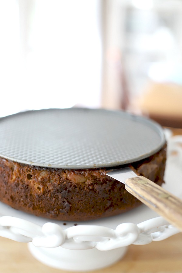 Easy step-by-step recipe for spiced pear upside down cake. Caramelized pears top a moist cake with wonderful spices so perfect for fall and Thanksgiving dessert.