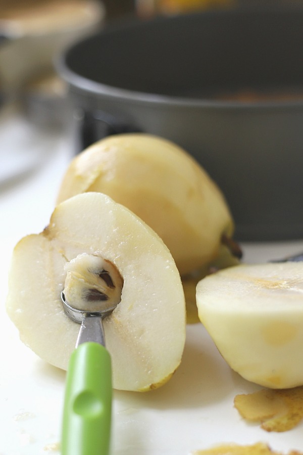 Easy step-by-step recipe for spiced pear upside down cake. Caramelized pears top a moist cake with wonderful spices so perfect for fall and Thanksgiving dessert.