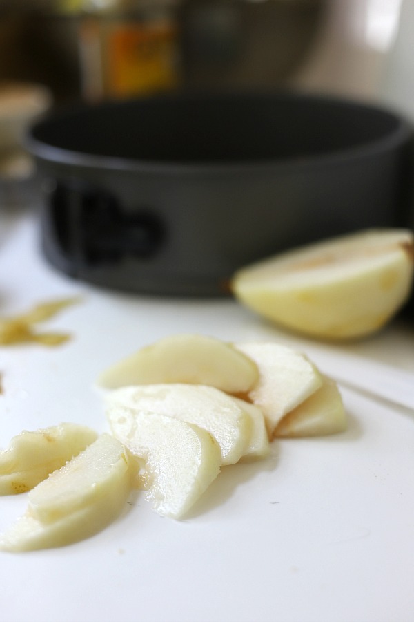 Easy step-by-step recipe for spiced pear upside down cake. Caramelized pears top a moist cake with wonderful spices so perfect for fall and Thanksgiving dessert.