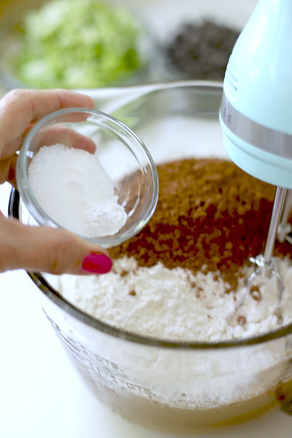 Easy step-by-step recipe for making super moist chocolate zucchini cupcakes with a creamy peanut butter frosting.