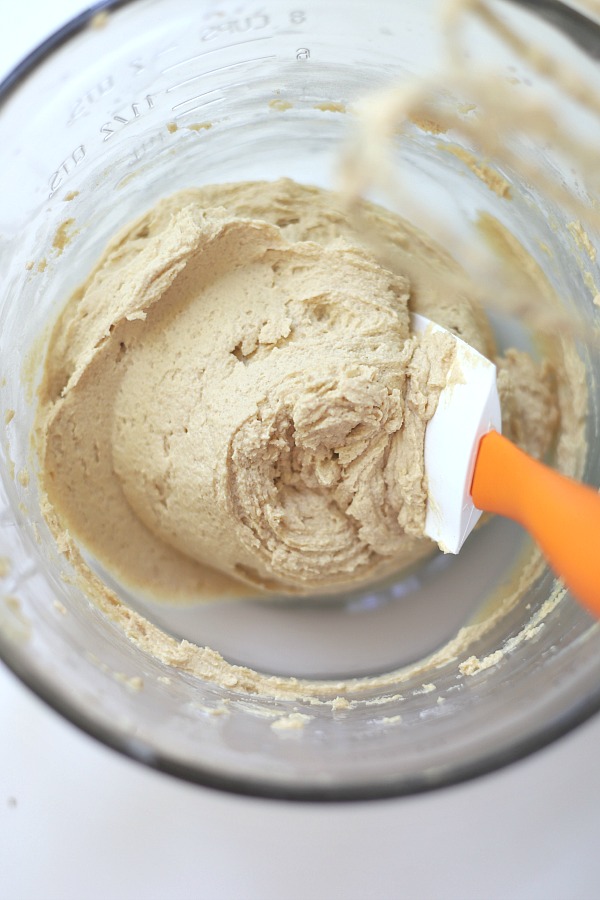 Easy step-by-step recipe for making super moist chocolate zucchini cupcakes with a creamy peanut butter frosting.