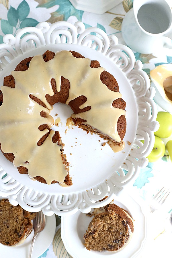 Moist and delicious, applesauce cake is amazing with a caramel topping! Easy, old-fashioned recipe perfectly spiced fall dessert.