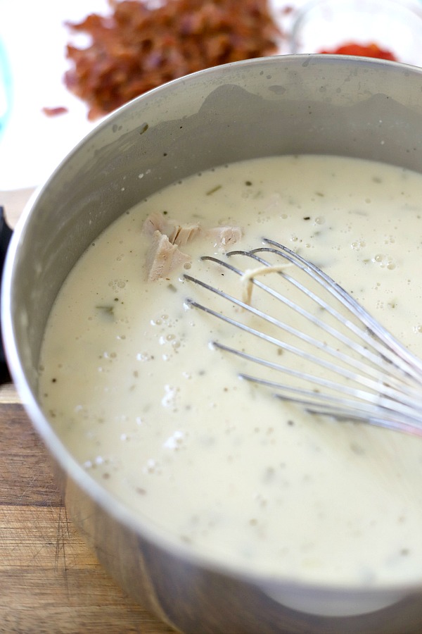 Easy to make, chicken wild rice soup combines chunks of chicken, wild rice, green onions and bacon in a creamy broth. Special enough for company and easy enough for a yummy weeknight meal.