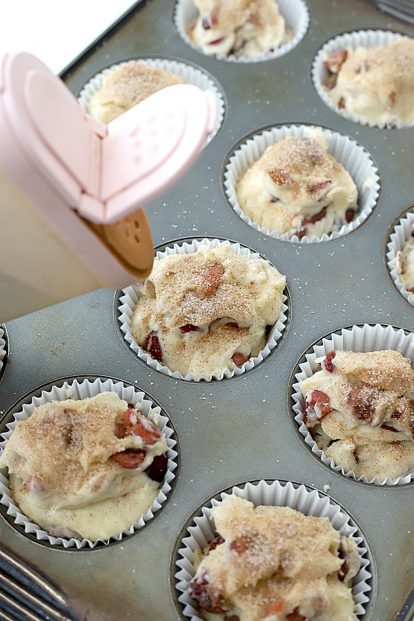 Bake a batch of cherry almond muffins for breakfast, snacking or teatime. Their cake-like texture filled with chunks of cherry and toasted almonds make them a hit! Easy recipe that goes together fast.