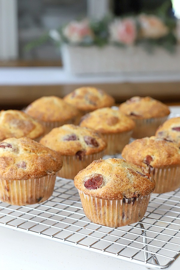 Bake a batch of cherry almond muffins for breakfast, snacking or teatime. Their cake-like texture filled with chunks of cherry and toasted almonds make them a hit! Easy recipe that goes together fast.