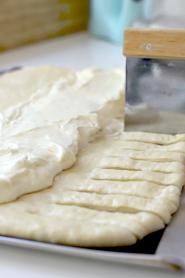 Step-by-step directions for easy cream cheese bread from yeast dough using a bread machine. A light and fluffy Danish with sweetened cheese filling is perfect for breakfast, as a snack or even dessert.