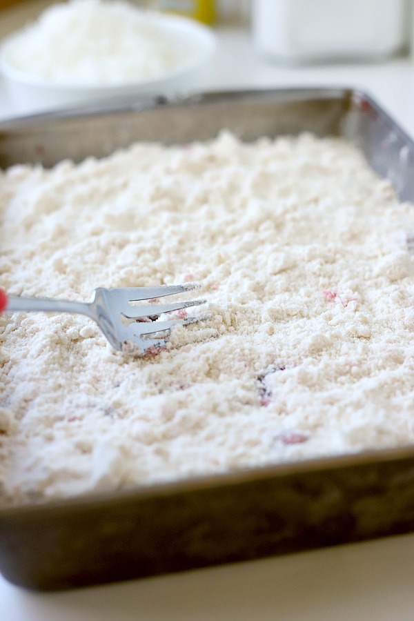 Easy recipe for cherry pineapple cabana cake with toasted coconut and nuts. A perfect dump cake dessert for any occasion.