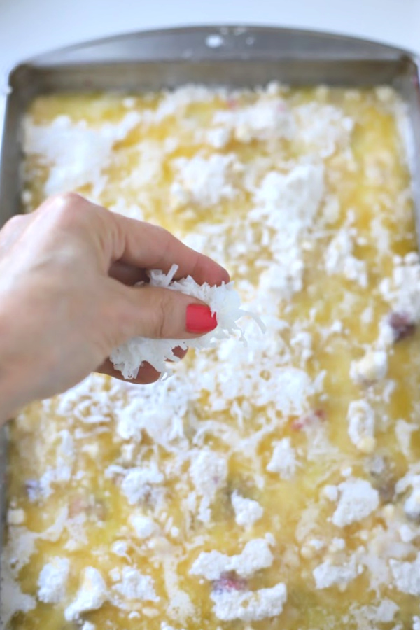 Easy recipe for cherry pineapple cabana cake with toasted coconut and nuts. A perfect dump cake dessert for any occasion.