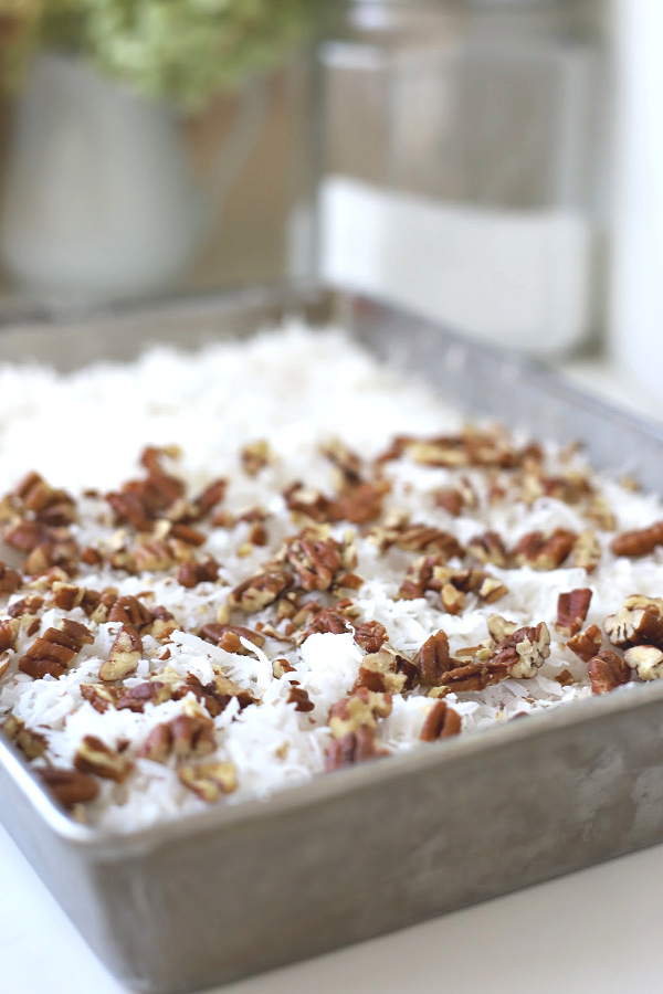 Easy recipe for cherry pineapple cabana cake with toasted coconut and nuts. A perfect dump cake dessert for any occasion.