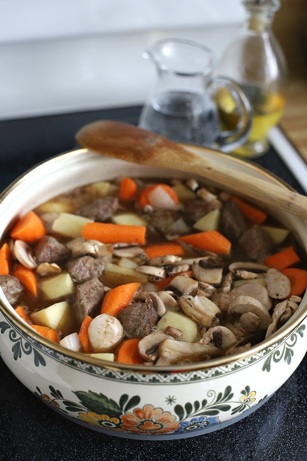 Easy recipe for comforting Stroganoff Stew is filled with chunks of beef, potatoes, carrots and mushrooms in a rich sour cream gravy.