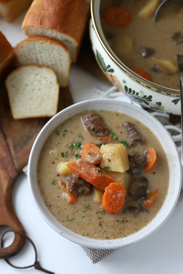 Easy recipe for comforting Stroganoff Stew is filled with chunks of beef, potatoes, carrots and mushrooms in a rich sour cream gravy.