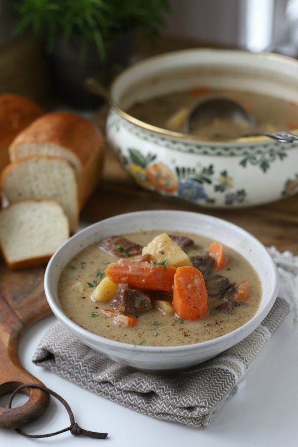 Easy recipe for comforting Stroganoff Stew is filled with chunks of beef, potatoes, carrots and mushrooms in a rich sour cream gravy.