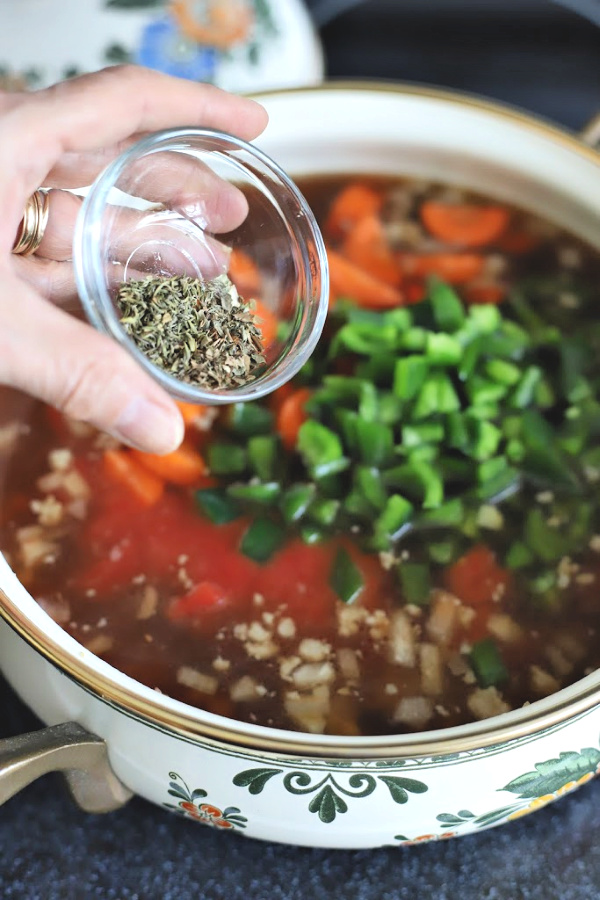 Easy recipe for robust and flavorful Italian sausage soup is a meal in a bowl. Tender vegetables with sausage and tortellini in a tomato broth will warm you soul and tummy.