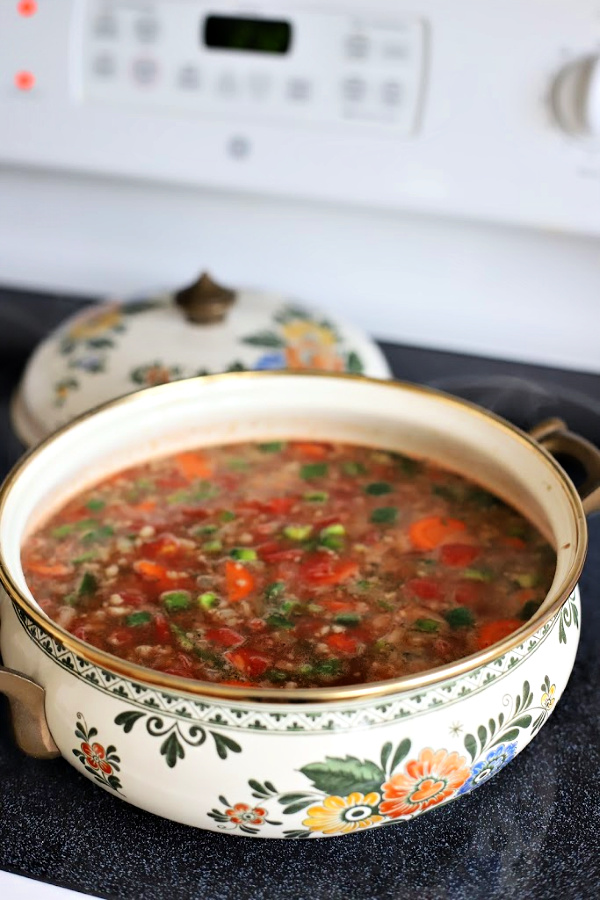 Easy recipe for robust and flavorful Italian sausage soup is a meal in a bowl. Tender vegetables with sausage and tortellini in a tomato broth will warm you soul and tummy.