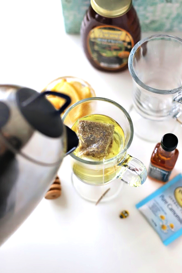 Make a very easy recipe for Hot Toddy when a cold or the flu has you down. It is warm and tasty with whiskey, tea, honey and lemon to help relieve symptoms so you can rest and feel better.