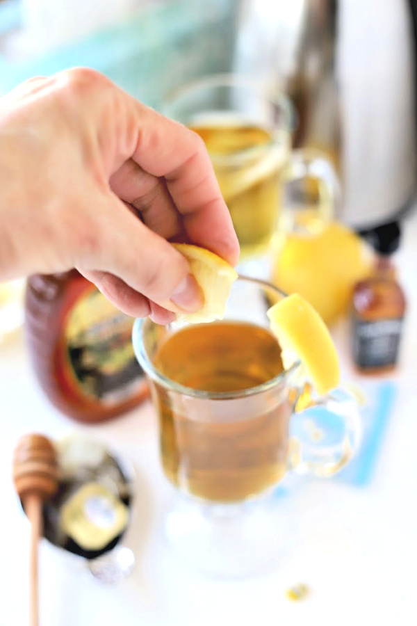 Make a very easy recipe for Hot Toddy when a cold or the flu has you down. It is warm and tasty with whiskey, tea, honey and lemon to help relieve symptoms so you can rest and feel better.